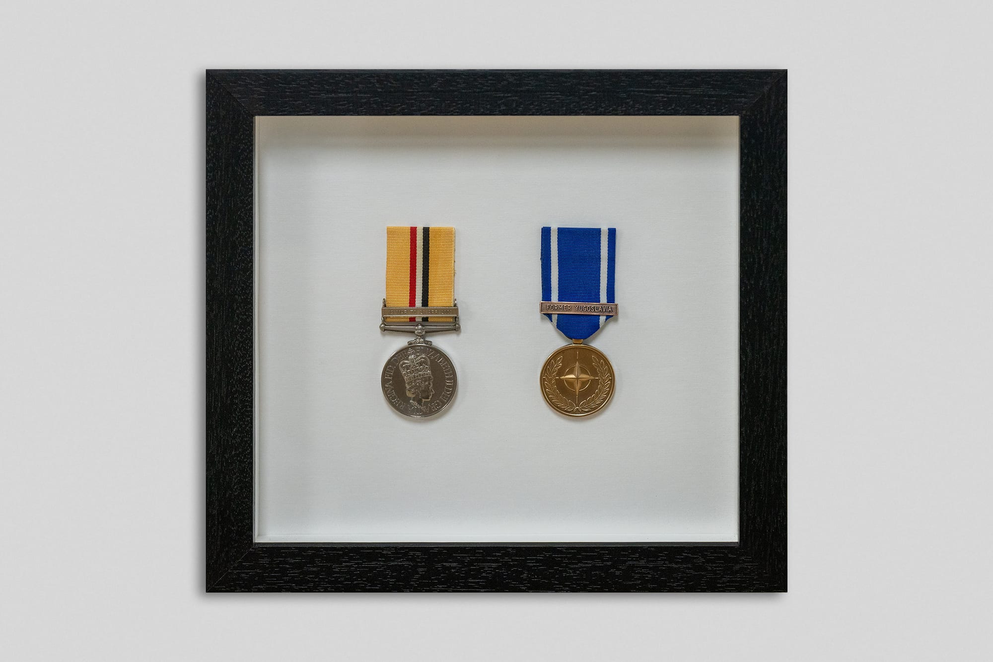 Service medals, deep shadow box mount