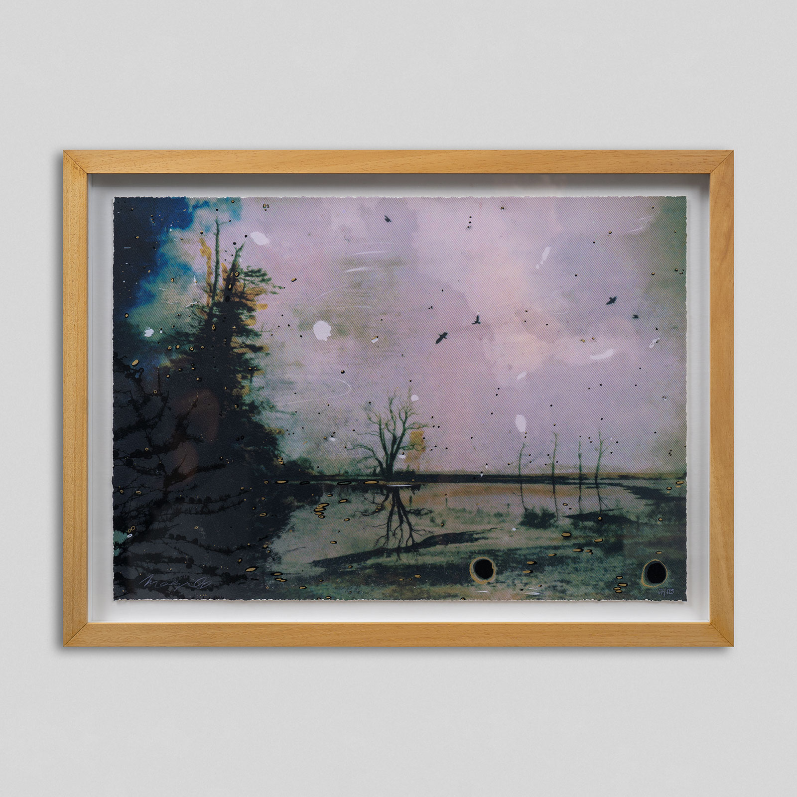 Custom-framed artwork on the wall